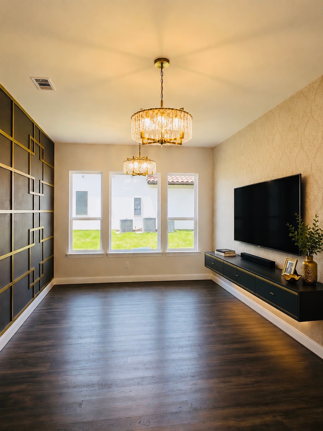 Plano Residence — media room with gold and black accent wall